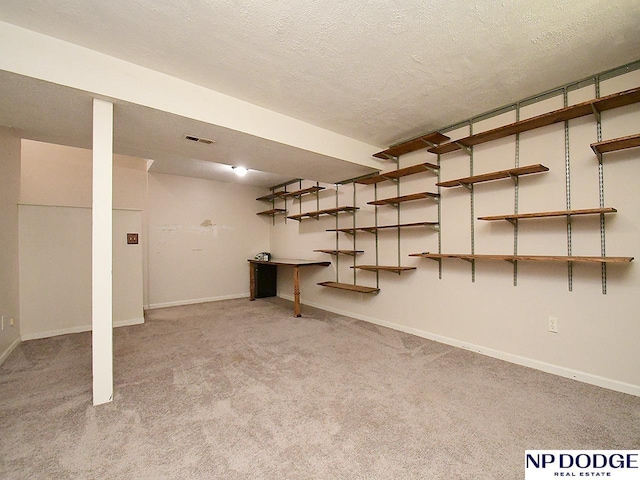 12067 Patrick Ave, Omaha, NE 68164 - finished basement with carpet, baseboards, and a textured ceiling