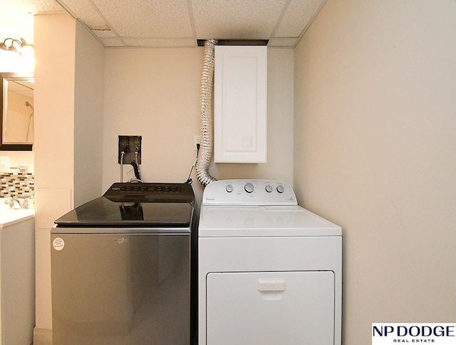 12067 Patrick Ave, Omaha, NE 68164 - laundry room featuring washer and dryer and cabinet space