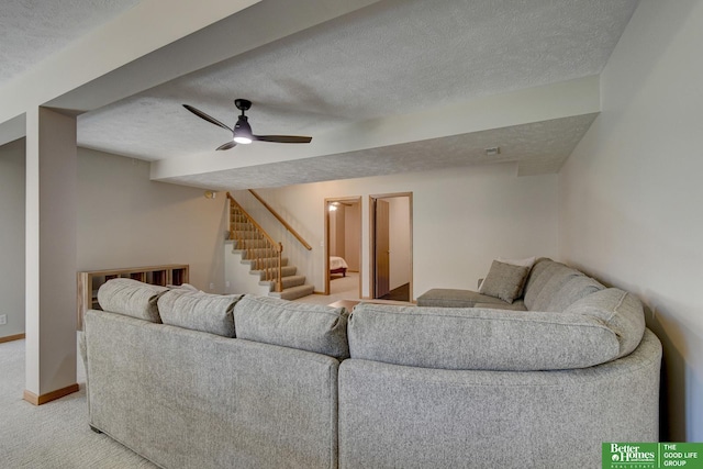 17139 S St, Omaha, NE 68135 - living area featuring light carpet, a textured ceiling, stairs, a ceiling fan, and baseboards