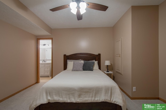 17139 S St, Omaha, NE 68135 - bedroom featuring light carpet, baseboards, connected bathroom, and a ceiling fan