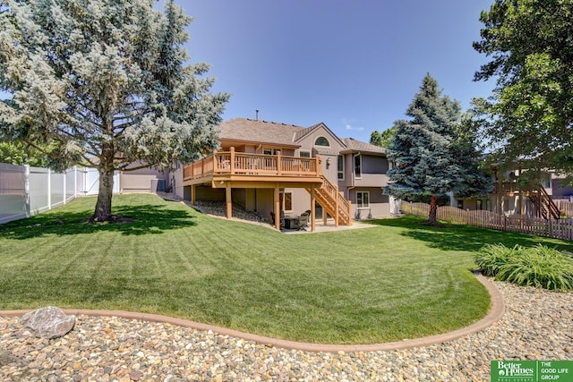 17139 S St, Omaha, NE 68135 - back of property with stairway, a wooden deck, and stucco siding