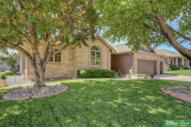 17139 S St, Omaha, NE 68135 - ranch-style home with brick siding, a garage, and concrete driveway