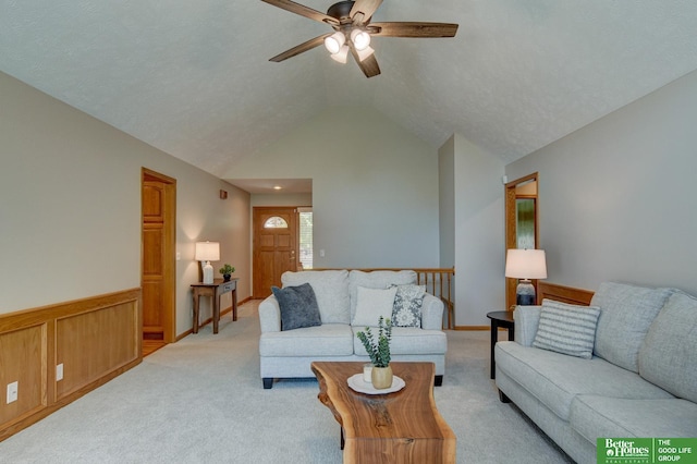 17139 S St, Omaha, NE 68135 - living room with ceiling fan, light carpet, vaulted ceiling, and wainscoting