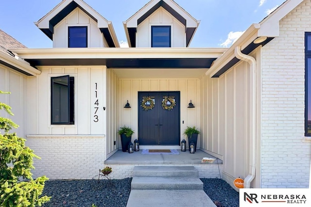 11473 S 189th St, Gretna, NE 68028 - entrance to property featuring board and batten siding and brick siding