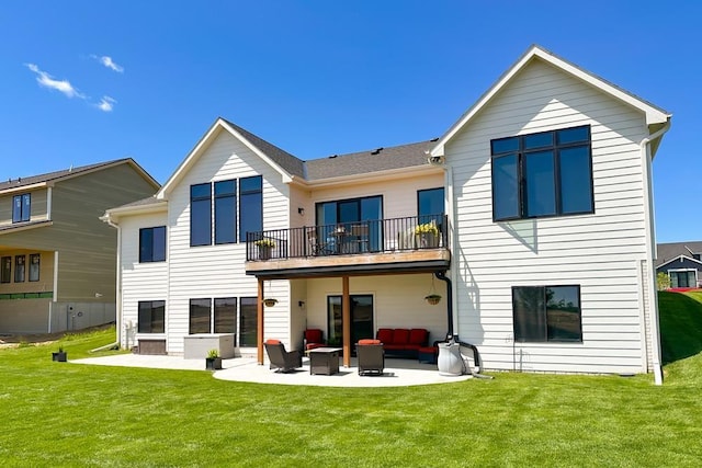 11473 S 189th St, Gretna, NE 68028 - rear view of house featuring a balcony, an outdoor living space, a patio area, and a yard