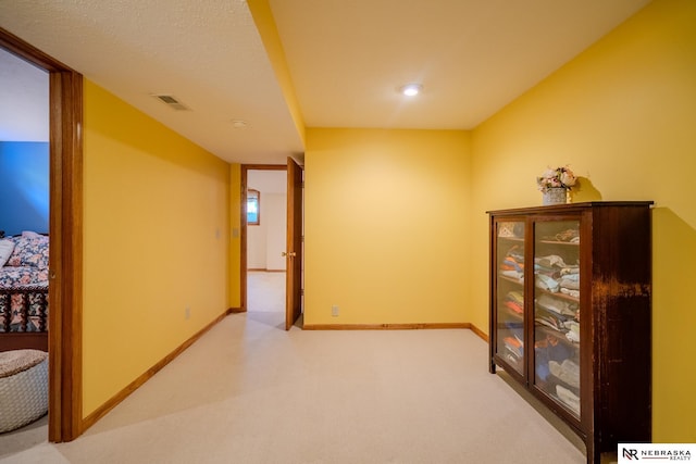 9910 Ohio St, Omaha, NE 68134 - hallway featuring carpet, baseboards, and recessed lighting