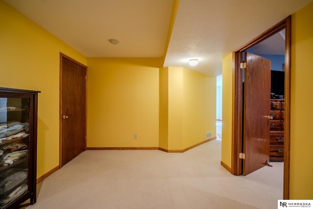 9910 Ohio St, Omaha, NE 68134 - hallway with light colored carpet and baseboards