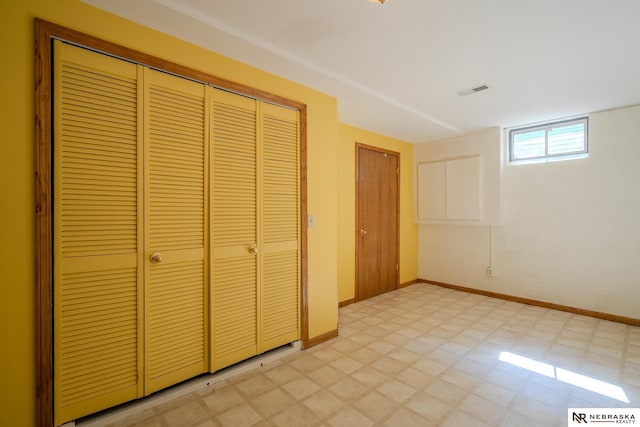9910 Ohio St, Omaha, NE 68134 - unfurnished bedroom featuring light floors and baseboards