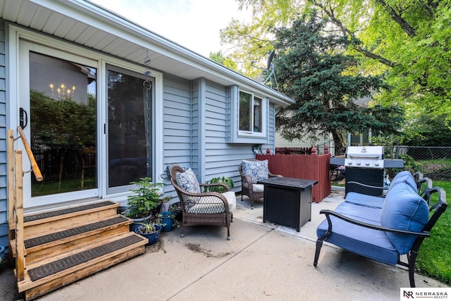 9910 Ohio St, Omaha, NE 68134 - view of patio featuring entry steps, area for grilling, and outdoor lounge area