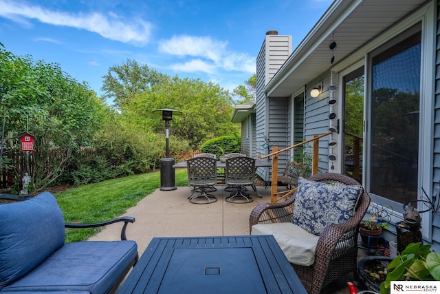 9910 Ohio St, Omaha, NE 68134 - view of patio / terrace with outdoor dining area
