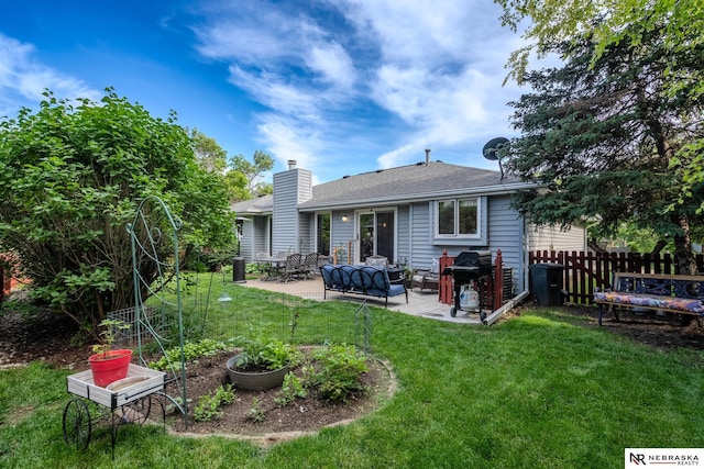 9910 Ohio St, Omaha, NE 68134 - rear view of house with a patio area, a chimney, an outdoor living space, and a shingled roof