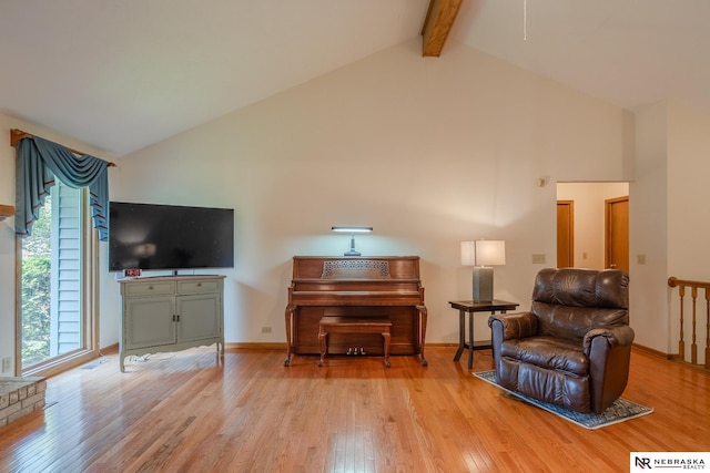 9910 Ohio St, Omaha, NE 68134 - sitting room featuring light wood-type flooring, high vaulted ceiling, beam ceiling, and baseboards