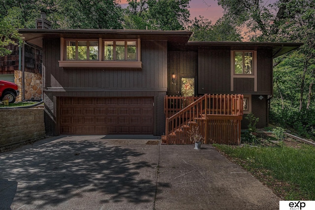 1214 Happy Hallow Ct, Plattsmouth, NE 68048 - view of front of house featuring driveway and an attached garage