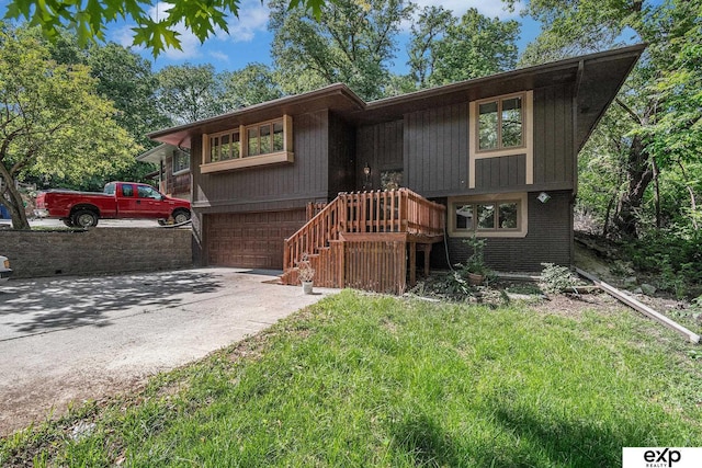 1214 Happy Hallow Ct, Plattsmouth, NE 68048 - view of front of property with an attached garage and driveway
