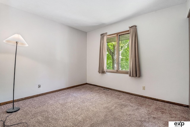 1214 Happy Hallow Ct, Plattsmouth, NE 68048 - carpeted empty room with baseboards