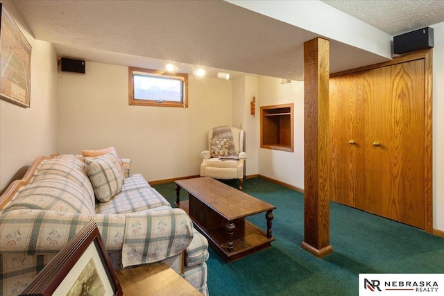 4542 Charles St, Omaha, NE 68132 - carpeted living area featuring a textured ceiling and baseboards