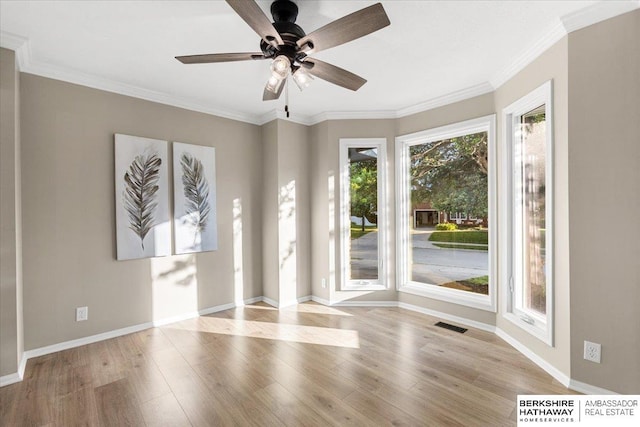 16324 Chicago St, Omaha, NE 68118 - unfurnished room featuring wood finished floors, baseboards, a ceiling fan, and crown molding
