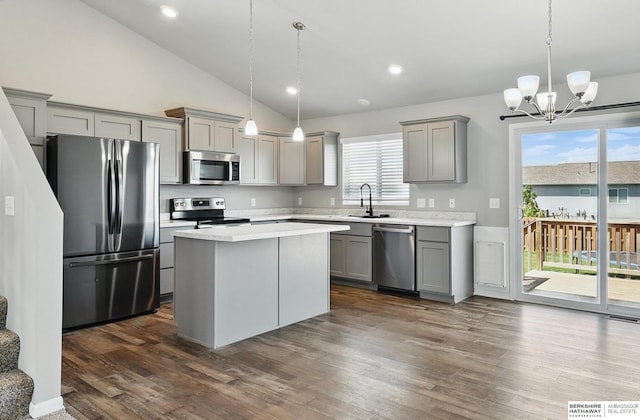 7164 N 167th St, Bennington, NE 68007 - kitchen featuring gray cabinets, appliances with stainless steel finishes, a sink, light countertops, and dark wood-style flooring