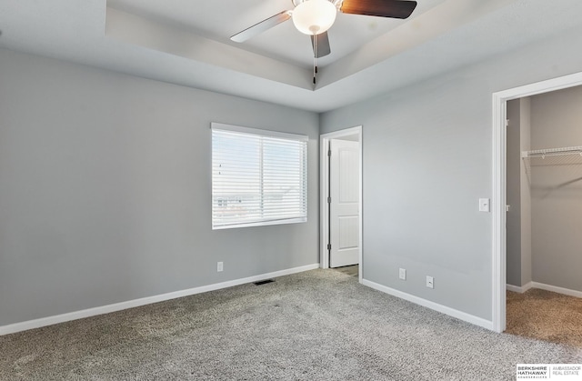 7164 N 167th St, Bennington, NE 68007 - unfurnished bedroom featuring carpet floors, a spacious closet, baseboards, and a closet