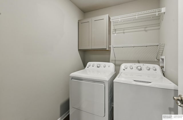 7164 N 167th St, Bennington, NE 68007 - washroom featuring cabinet space and independent washer and dryer