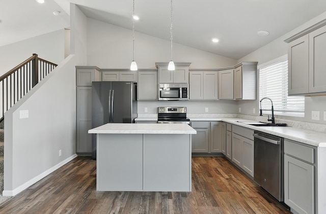 7164 N 167th St, Bennington, NE 68007 - kitchen featuring stainless steel appliances, gray cabinets, a sink, recessed lighting, and high vaulted ceiling