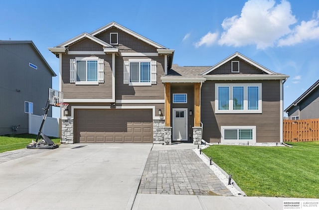 7164 N 167th St, Bennington, NE 68007 - view of front of house with an attached garage, concrete driveway, and stone siding