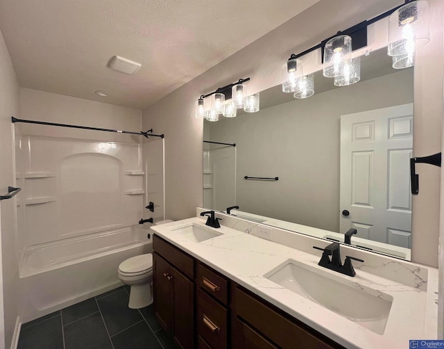 4618 N 212th St, Elkhorn, NE 68022 - bathroom featuring tile patterned floors, double vanity,  shower combination, toilet, and a textured ceiling