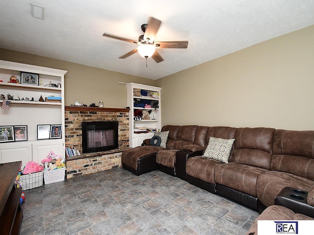 2103 Randall Dr, Bellevue, NE 68005 - living room with ceiling fan, stone finish floors, and a brick fireplace