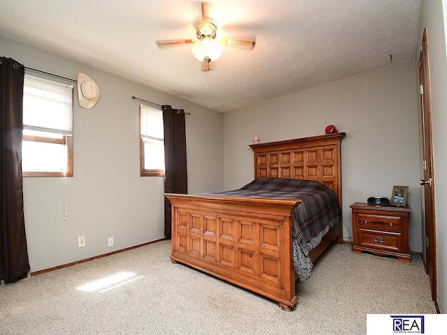 2103 Randall Dr, Bellevue, NE 68005 - bedroom featuring carpet, baseboards, and ceiling fan