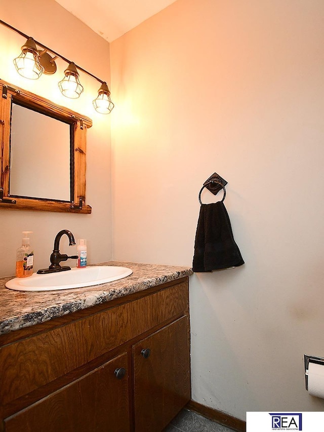 2103 Randall Dr, Bellevue, NE 68005 - bathroom with vanity and baseboards