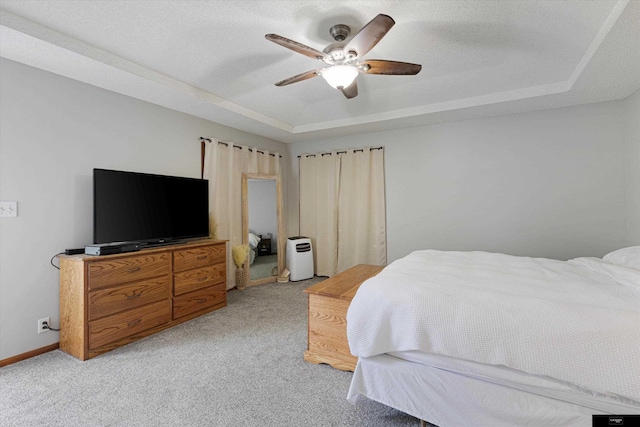2706 Overlook Cir, Plattsmouth, NE 68048 - bedroom with a raised ceiling, light colored carpet, baseboards, and ceiling fan