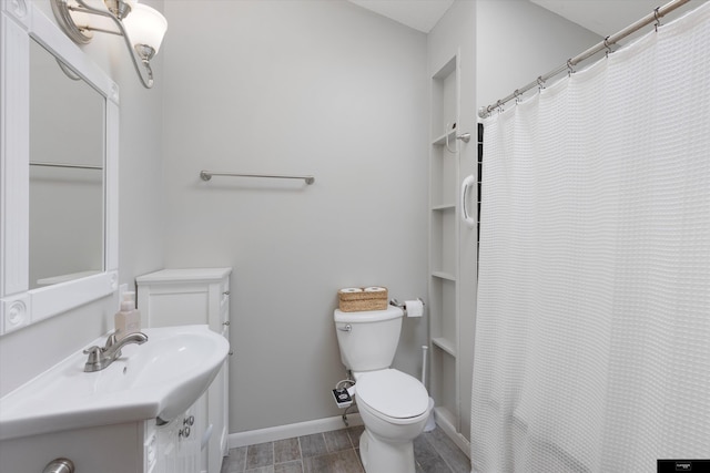 2706 Overlook Cir, Plattsmouth, NE 68048 - bathroom featuring toilet, vanity, baseboards, and a shower with shower curtain