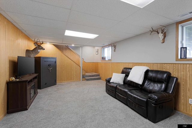 2706 Overlook Cir, Plattsmouth, NE 68048 - living room with wood walls, stairway, carpet floors, a paneled ceiling, and a wainscoted wall
