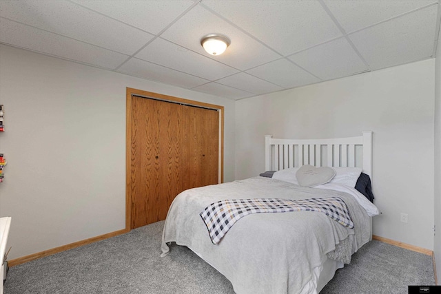 2706 Overlook Cir, Plattsmouth, NE 68048 - bedroom featuring a paneled ceiling, carpet floors, a closet, and baseboards