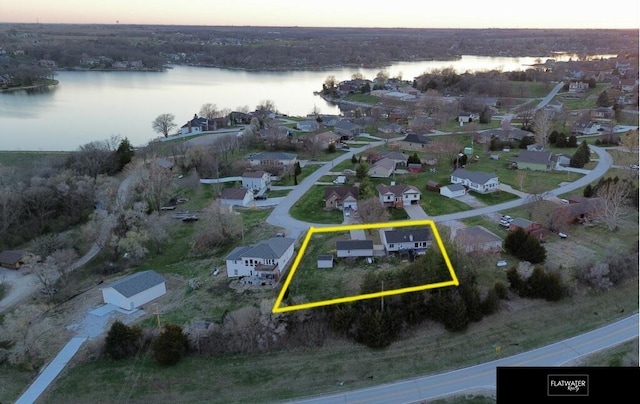 2706 Overlook Cir, Plattsmouth, NE 68048 - aerial view at dusk of a water view, property boundaries highlighted, and a residential view