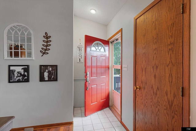 2706 Overlook Cir, Plattsmouth, NE 68048 - foyer with baseboards and light tile patterned floors