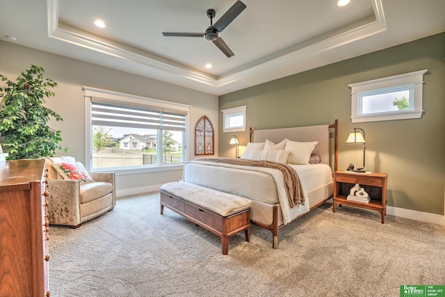 12369 Cooper St, Papillion, NE 68046 - carpeted bedroom featuring a raised ceiling, baseboards, ornamental molding, recessed lighting, and a ceiling fan