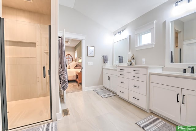 12369 Cooper St, Papillion, NE 68046 - ensuite bathroom with lofted ceiling, a stall shower, and vanity