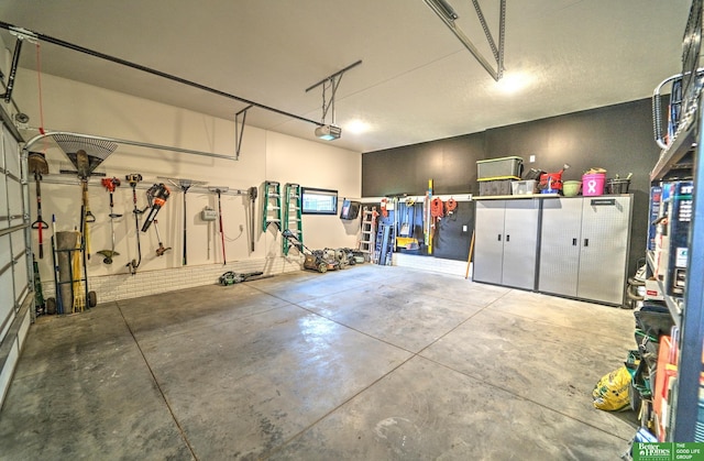 12369 Cooper St, Papillion, NE 68046 - garage with a garage door opener