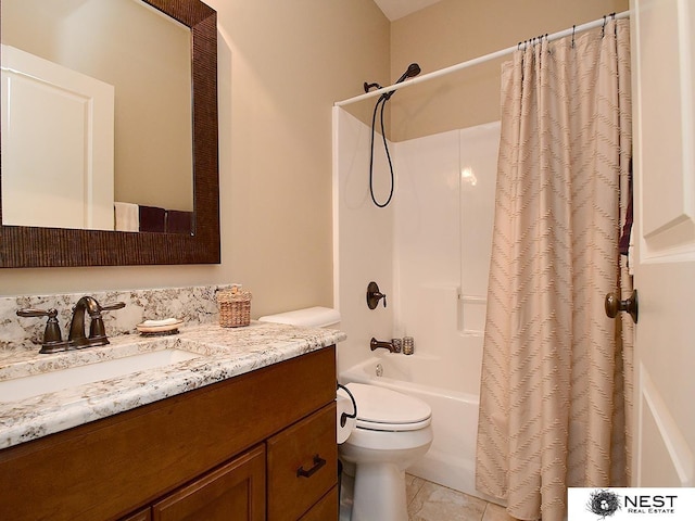7521 Exbury Rd, Lincoln, NE 68516 - bathroom featuring vanity, shower / bath combo with shower curtain, and toilet