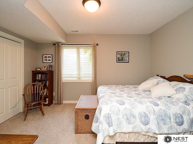 7521 Exbury Rd, Lincoln, NE 68516 - bedroom with light carpet and baseboards