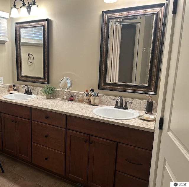 7521 Exbury Rd, Lincoln, NE 68516 - full bath featuring double vanity and tile patterned floors
