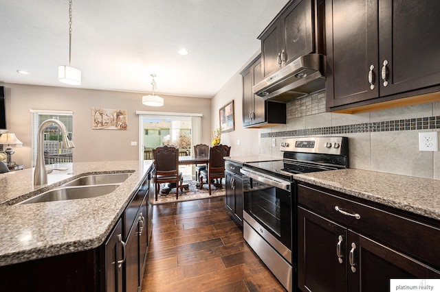 19349 I St, Omaha, NE 68135 - kitchen with electric stove, a sink, under cabinet range hood, hanging light fixtures, and healthy amount of natural light