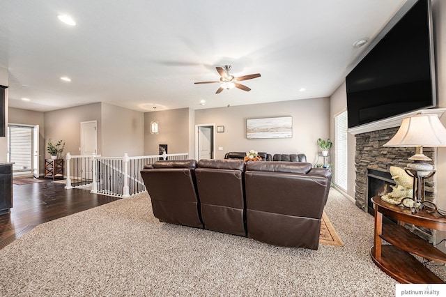 19349 I St, Omaha, NE 68135 - living room with ceiling fan, a stone fireplace, recessed lighting, and wood finished floors