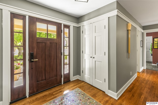 9826 Harney Pkwy N, Omaha, NE 68114 - entrance foyer with wood finished floors and baseboards