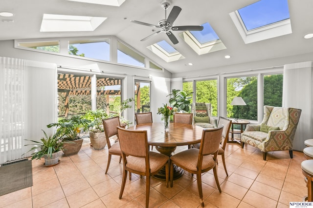 9826 Harney Pkwy N, Omaha, NE 68114 - sunroom / solarium with a skylight, tile patterned flooring, vaulted ceiling, and recessed lighting