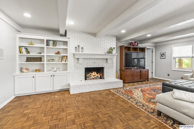9826 Harney Pkwy N, Omaha, NE 68114 - living room with beamed ceiling, baseboards, a brick fireplace, and recessed lighting