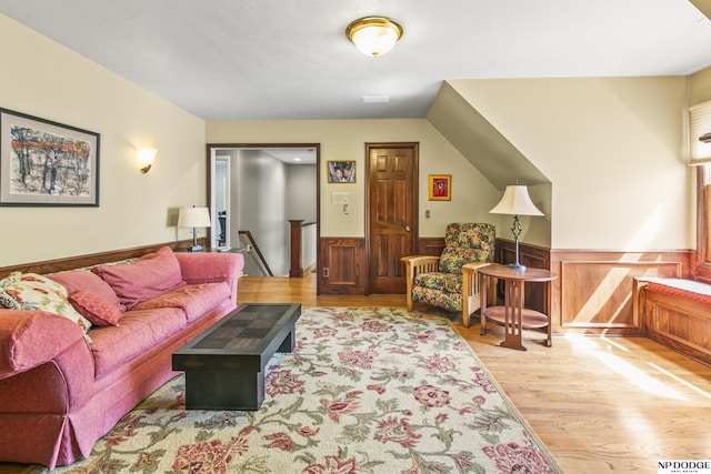 9826 Harney Pkwy N, Omaha, NE 68114 - living room featuring wood finished floors and wainscoting