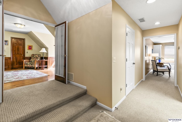 9826 Harney Pkwy N, Omaha, NE 68114 - hall with lofted ceiling, recessed lighting, baseboards, and light colored carpet
