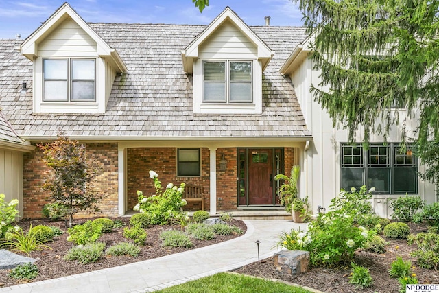 9826 Harney Pkwy N, Omaha, NE 68114 - view of front of property featuring brick siding and a porch
